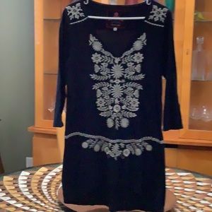 Johnny was beautiful embroidery looks great with leggings or over swim wear.